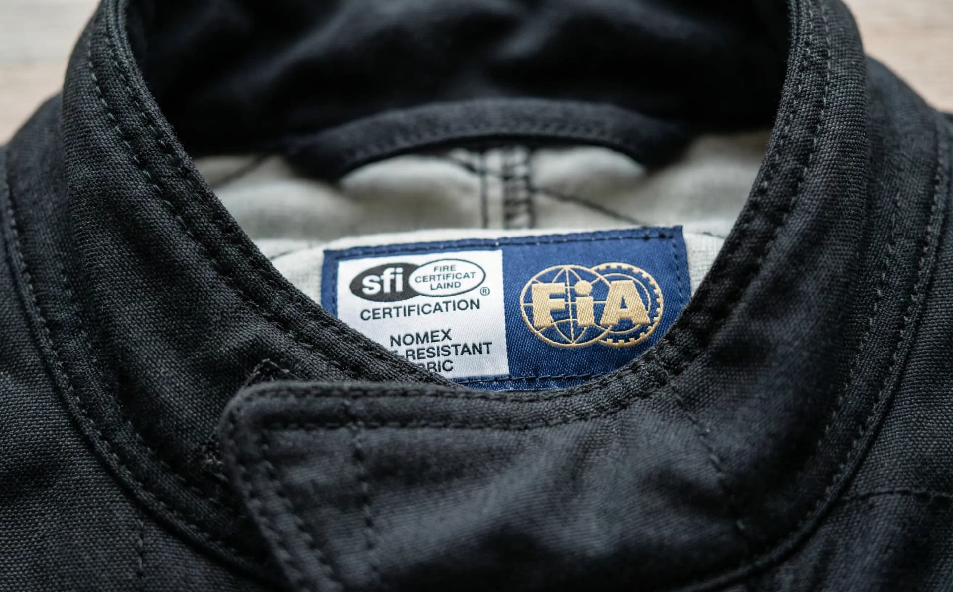 Custom multi-layer SFI 3.2A/5 drag racing fire suit for NHRA competition